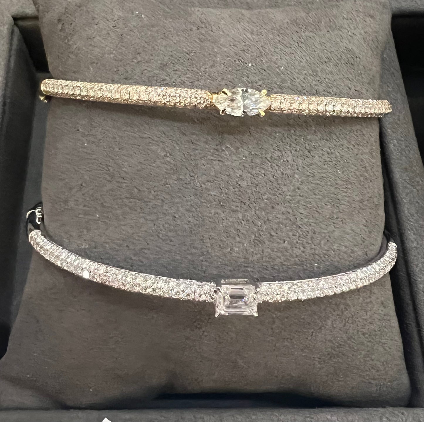 18K WHITE GOLD PAVE BANGLE WITH EMERALD CUT CENTER STONE