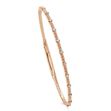 14K YELLOW GOLD FLEXIBLE DIAMOND BANGLE