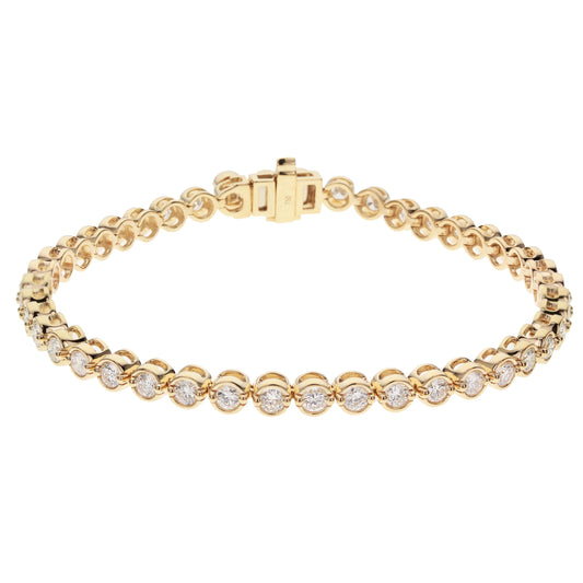 18K YELLOW GOLD 3 CT ROUND DIAMOND BEZEL SET TENNIS BRACELET