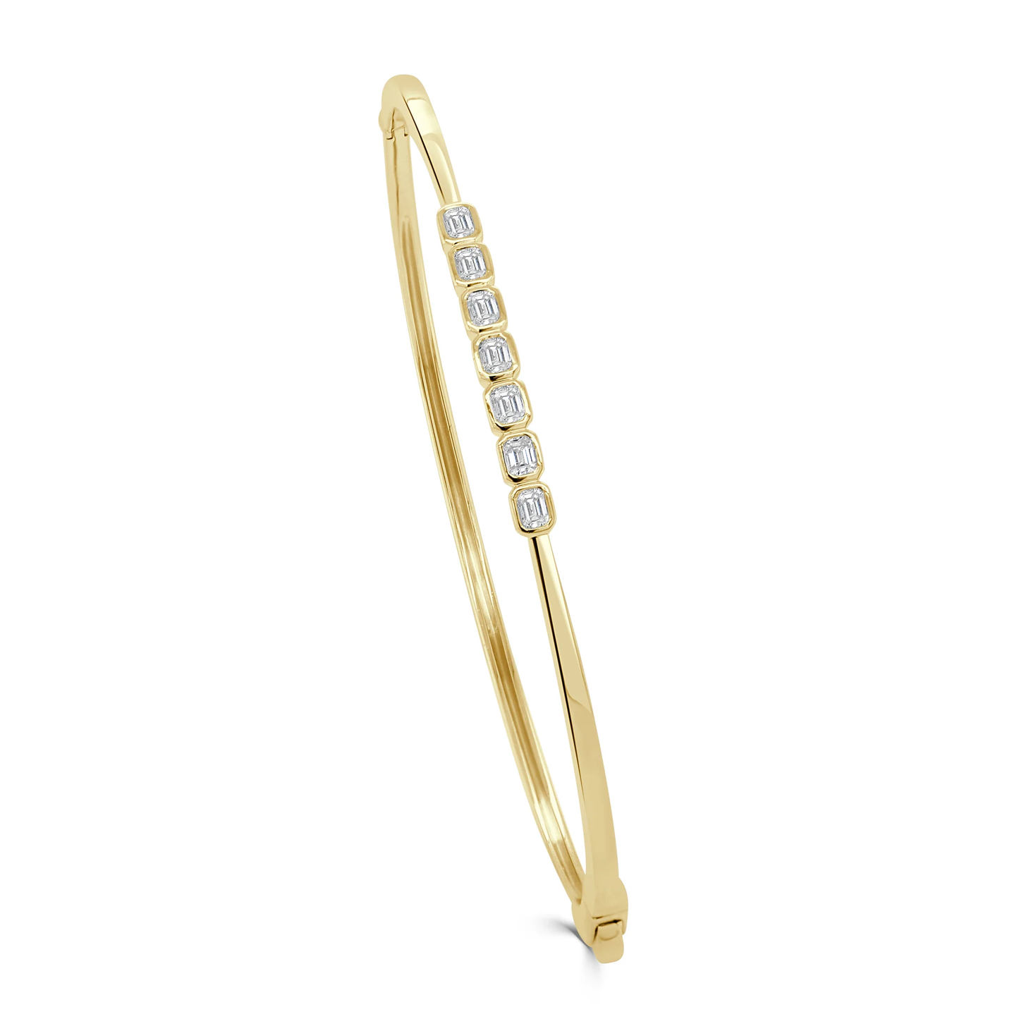 14K GOLD & EMERALD CUT 7 DIAMOND BEZEL SET BANGLE